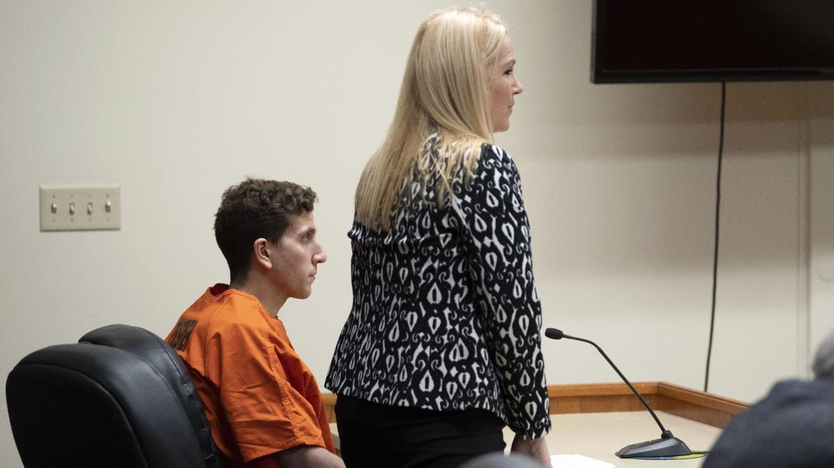 Bryan Kohberger, seated, who is accused of killing four University of Idaho students on Nov. 13, looks on as his attorney, public defender Anne Taylor, speaks during a January hearing.