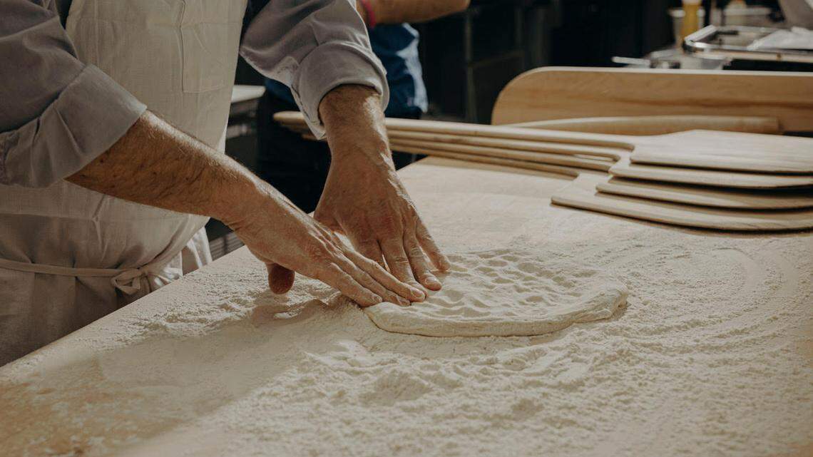 A pizza crust takes shape at the new Casanova Pizzeria. “We use one of the best milled flours in the country,” pizzaiolo Dan Guild says.
