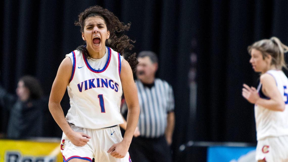 Coeur d’ Alene junior Teagan Colvin screams after sinking a 3-pointer that forced the first overtime in the Vikings’ semifinal game against Boise in the 5A state girls basketball tournament Friday at the Ford Idaho Center.