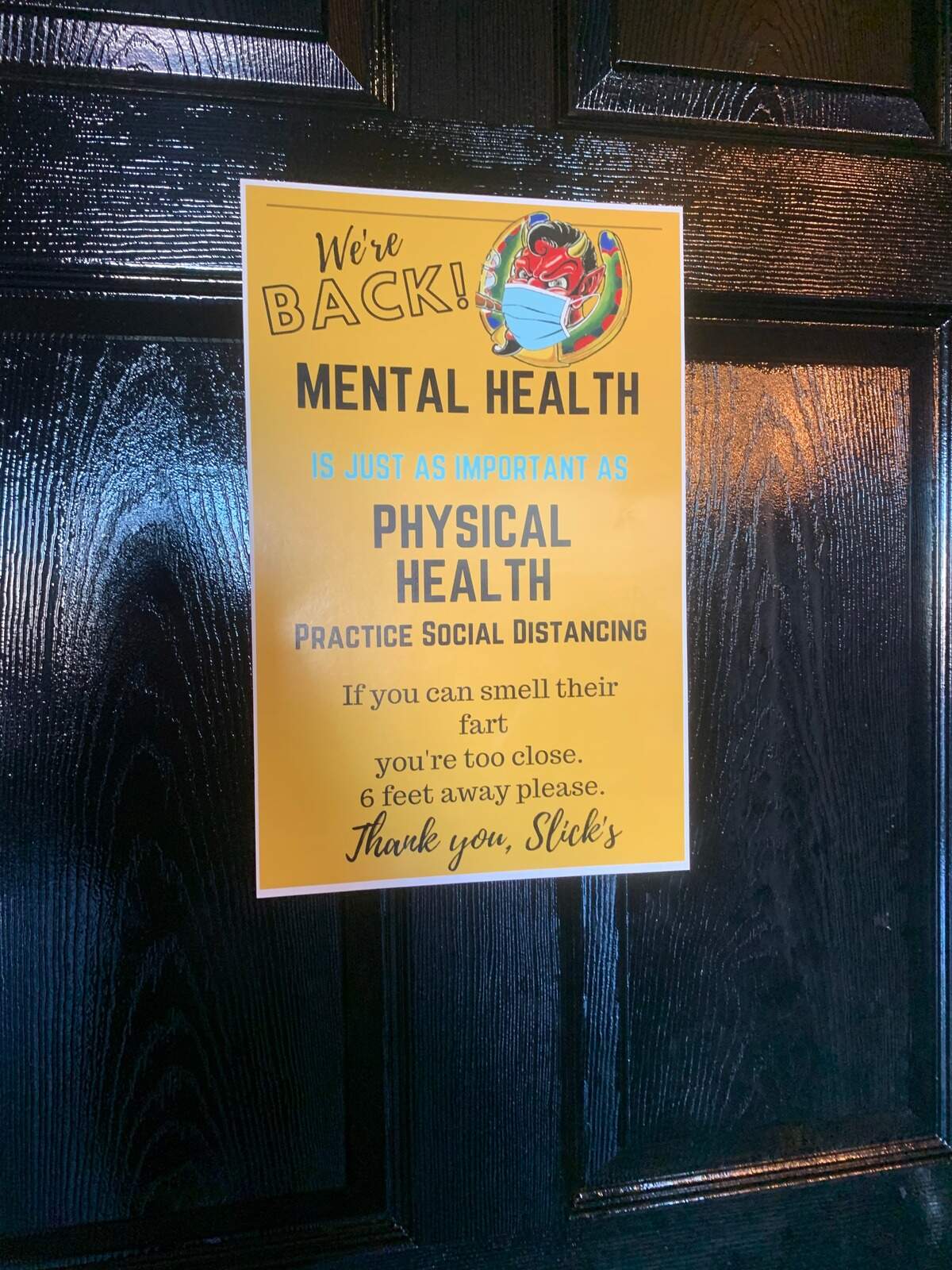 Slick’s Bar in Nampa placed a sign in the bathroom about social distancing, but its owner has said that governing whether people stay 6 feet apart is not her role.
