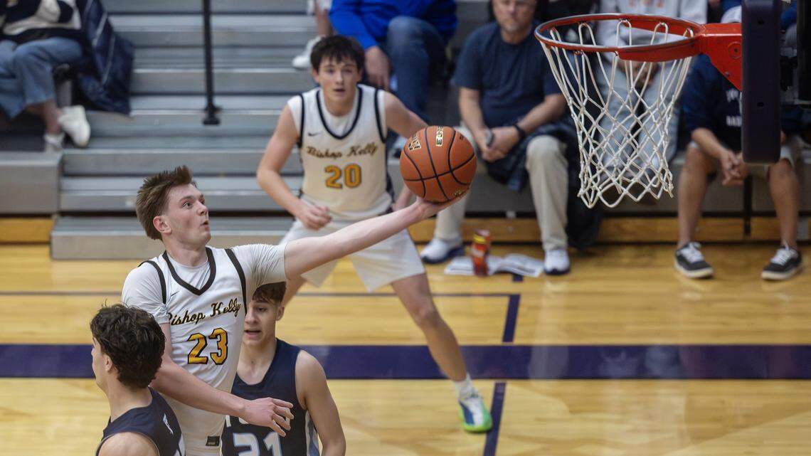 Bishop Kelly junior Gavin Kerr scores during their 5A boys basketball state tournament game against Twin Falls held at Rocky Mountain High School, Thursday, March 5, 2026. Bishop Kelly won 49-46.