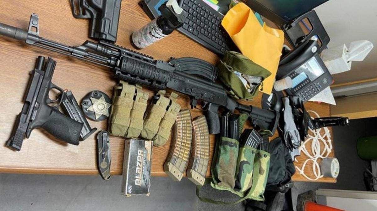 In searches of his property, agents found the convicted felon was in possession of four firearms, twelve magazines, spare rounds of ammunition and other gear, according to a sentencing memorandum.