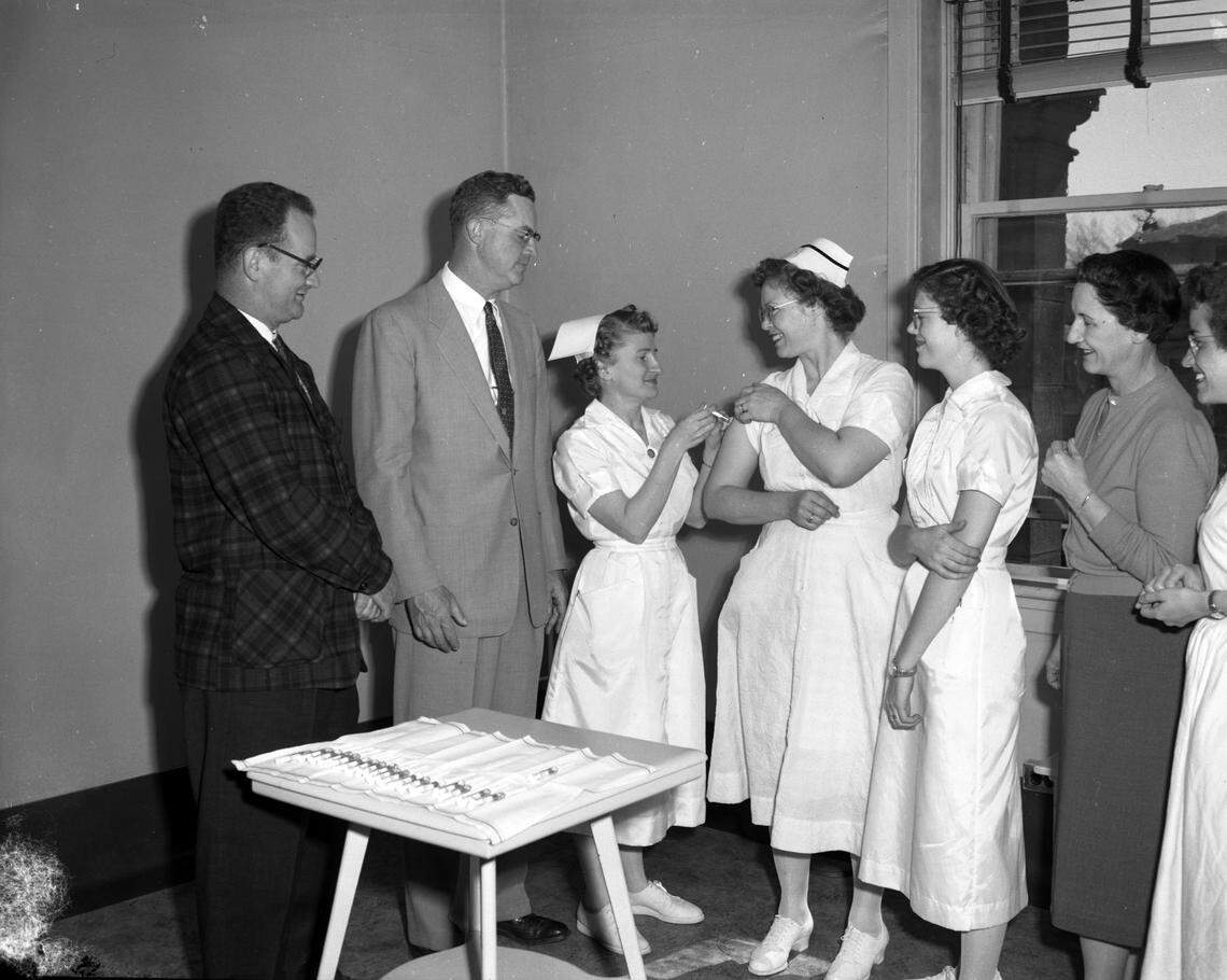 Health care workers line up to receive polio vaccines in 1957 at St. Luke’s Hospital in Boise.