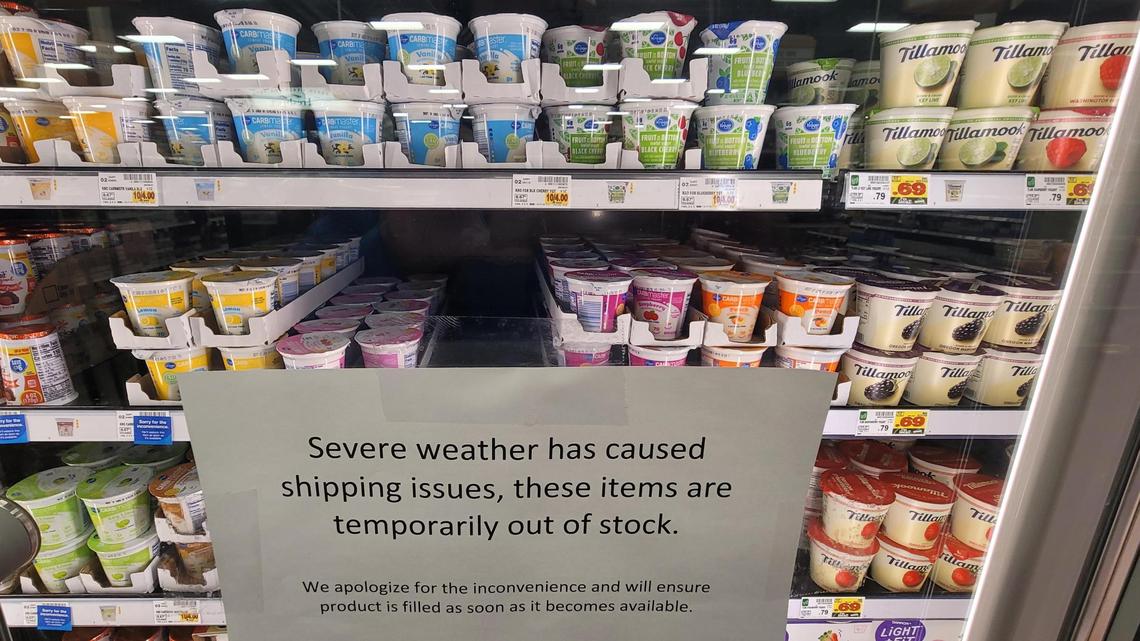 A yogurt cooler at a Fred Meyer store in Garden City was full Tuesday. Signs apologizing for earlier shortages were still in place.