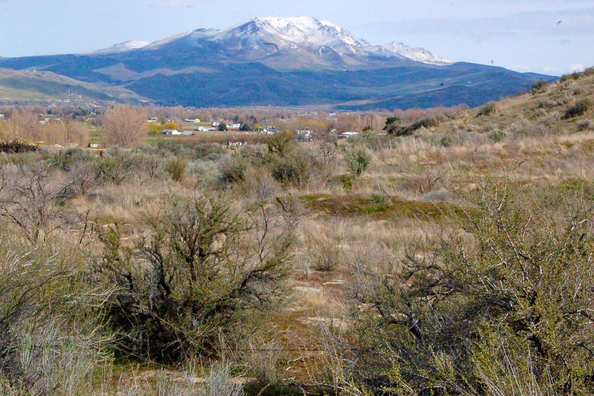 With spring snow, Sehewoki’I Newenee’an Katete towers over Emmett. The peak was renamed after the U.S. Department of the Interior removed derogatory slurs from the names of nearly 650 geographic features in the United States.