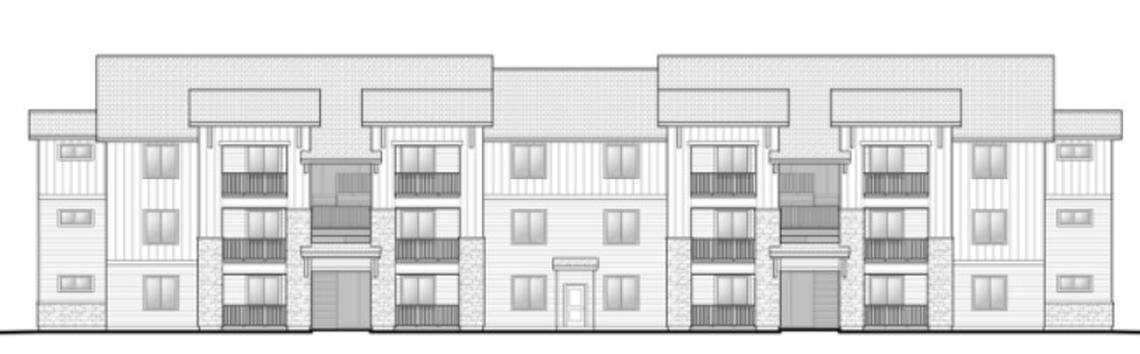 A front view of a proposed three-story apartment building in the proposed Delano Apartments.