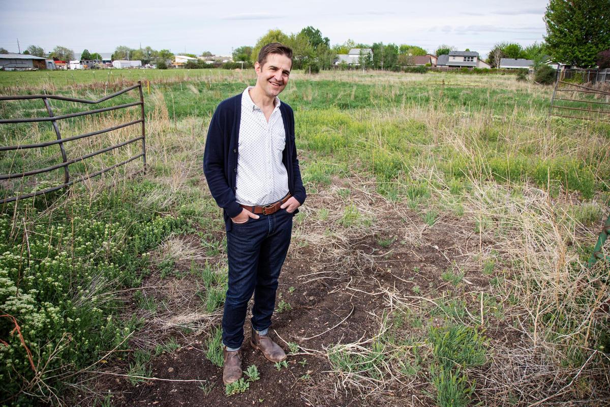 Bart Cochran, executive director of Leap Housing Solutions, stands in an agricultural area that will be the future sight of Whitney Commons, on Friday, May 7, 2021 in Boise behind Shamrock Avenue. Whitney Commons will be an affordable housing subdivision featuring 11 newly constructed homes for sale and one remodeled home for rent.