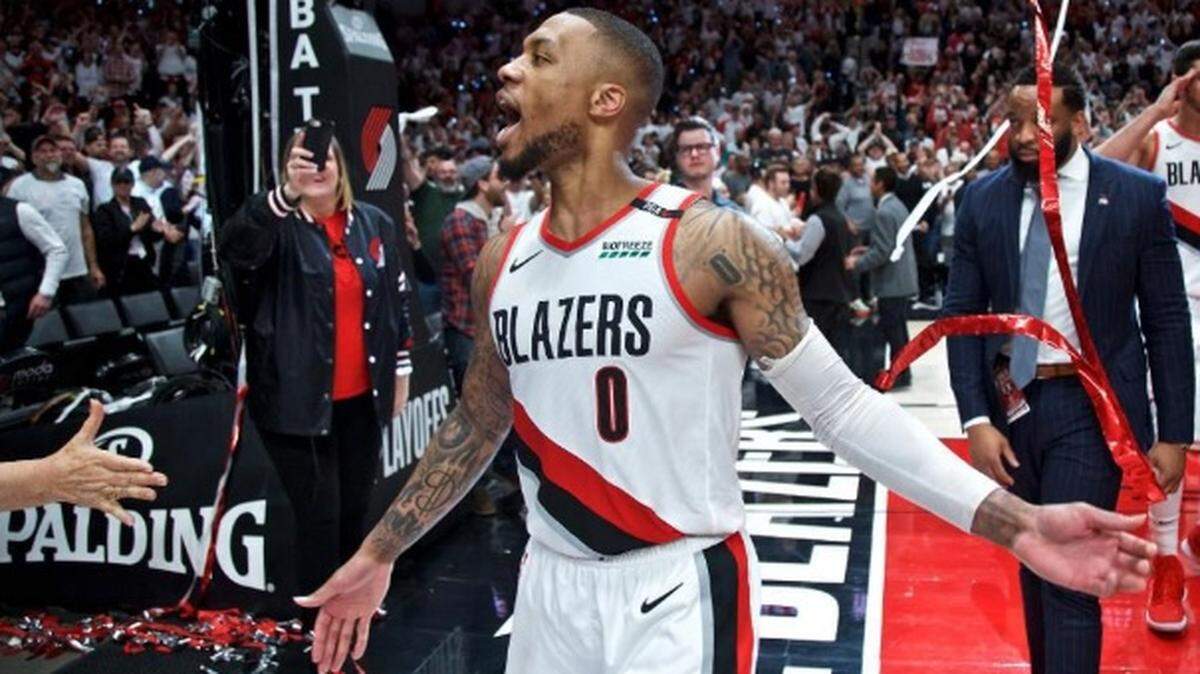 Portland Trail Blazers guard Damian Lillard celebrates after Game 5 of an NBA basketball first-round playoff series against the Oklahoma City Thunder on Tuesday, April 23, 2019, in Portland, Ore. The Trail Blazers won 118-115.