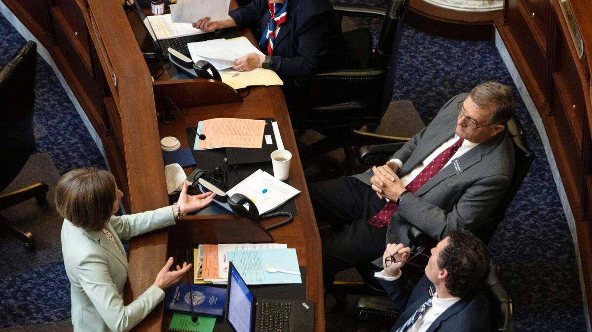 Rep. Julianne Young, R-Blackfoot, at left, speaks with Rep. Ryan Kerby, R-New Plymouth, before the start of the House session in March. The results of this year’s Kids Matter Index have been released by the organization Idaho Children Are Primary, a measuring stick for how well legislators work to protect the interests of children.