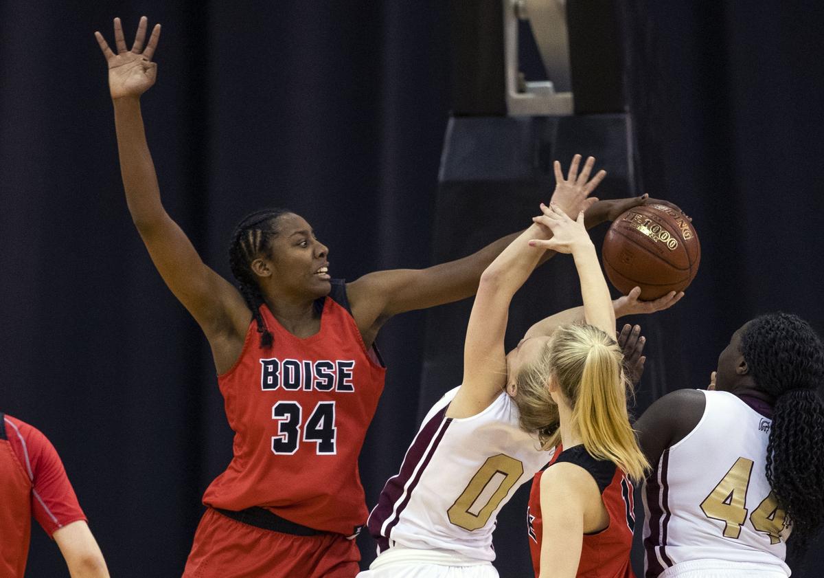 Boise’s Peyton McFarland rejects a Rigby shot during the first round of last year’s 5A state tournament.