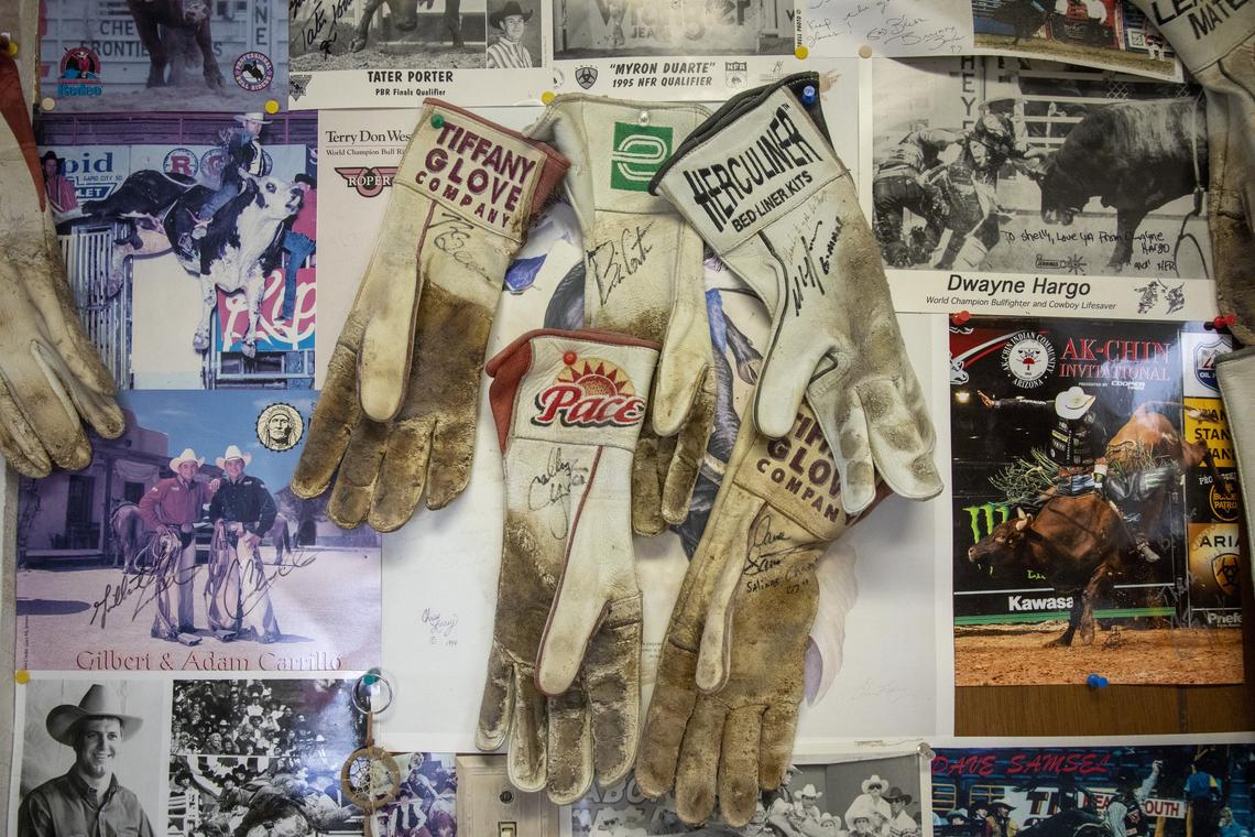 The walls at Tiffany Gloves in Payette are filled with photographs and autographed gloves of current and retired bull riders, who send them back to Bill and Joann White as momentos. “I’m proud of them all,” says Bill. (Bull riders only use one glove.)