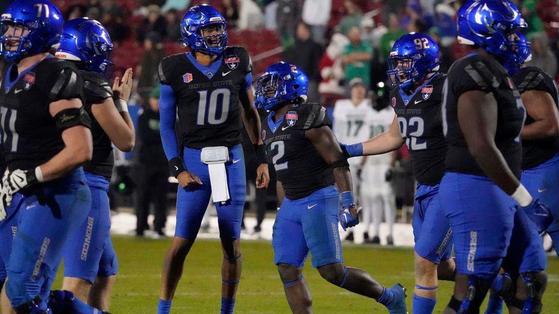 Boise State quarterback Taylen Green (10) celebrates a touchdown that running back Ashton Jeanty (2) scored against North Texas during the fourth quarter of the Frisco Bowl on Saturday in Frisco, Texas. Boise State won 35-32.