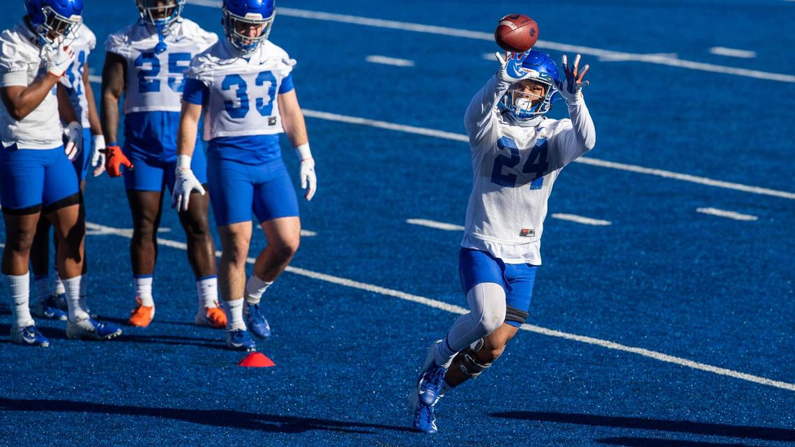 Boise State running back George Holani catches a pass during drills Friday on the blue turf of Albertsons Stadium in Boise. The Broncos have begun their spring football camp.