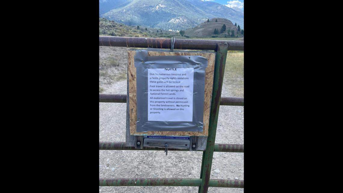 A sign posted on a gate on East Fork Road explains why motorized vehicle access has been cut off.