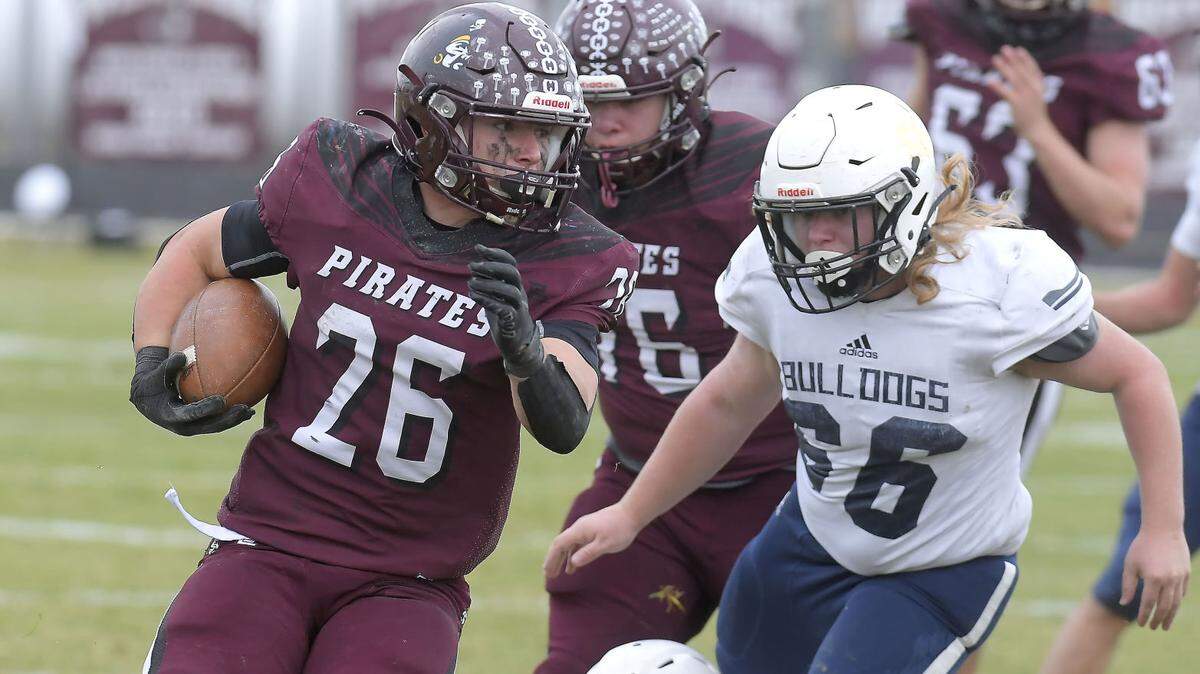 West Side’s Cage Brokens, left, was voted the 2A All-Idaho Football Player of the Year by the state’s coaches.