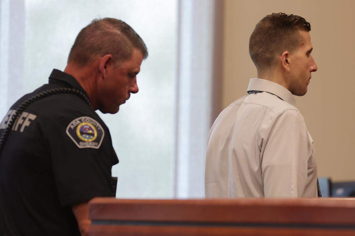 Bryan Kohberger, 30, who pleaded guilty to murdering four University of Idaho students, is escorted by a bailiff out of his change-of-plea hearing Wednesday at the Ada County Courthouse. He is expected to sentenced to spend the rest of his life in Idaho prison.