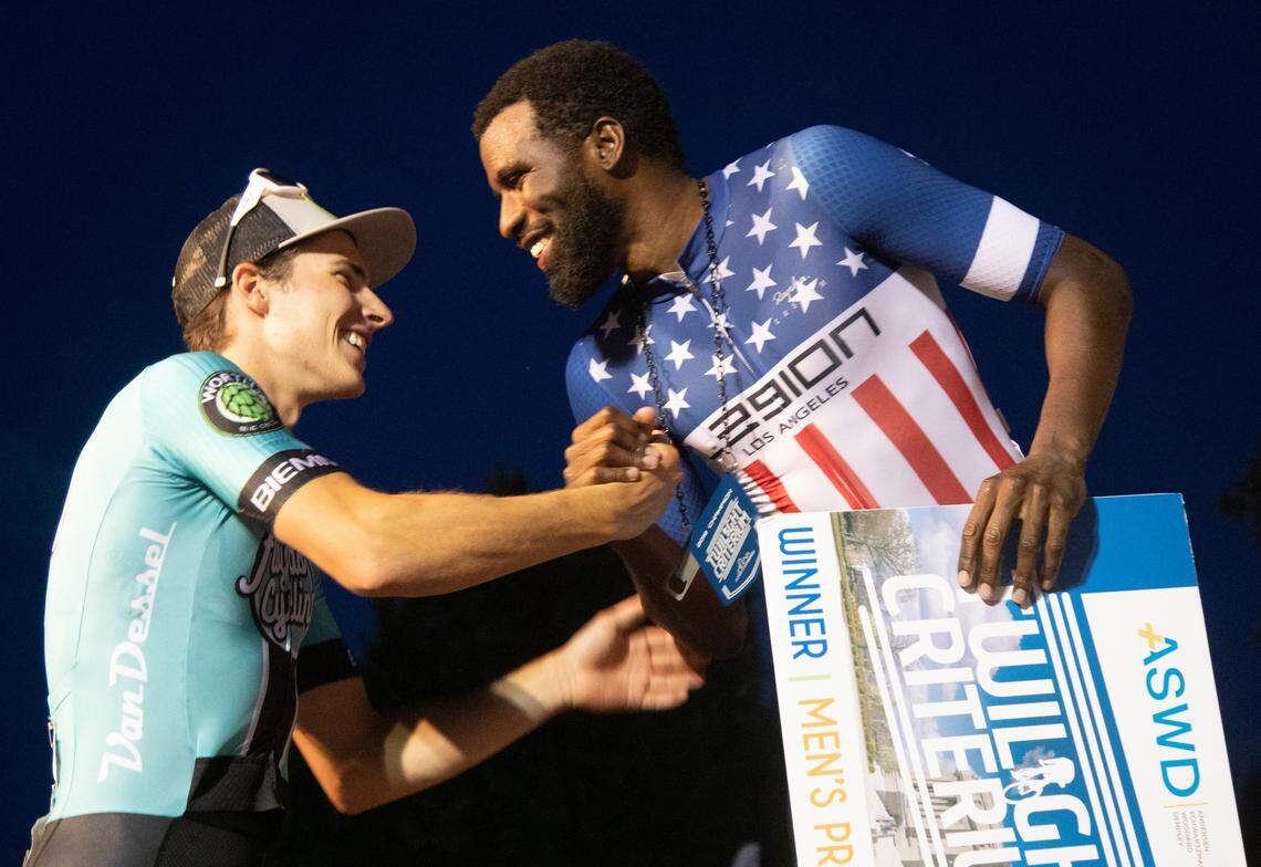 First place finisher Justin Williams greets Nicholas Zukowsky, who finished second in the men’s pro race in the 2019 Boise Twilight Criterium on Saturday, July 13, in Downtown Boise.