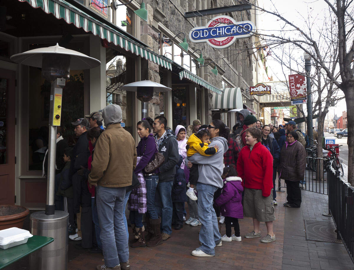 About 1,400 people were treated to a Christmas Day meal at Old Chicago in 2011. Volunteers helped serve food and deliver gift bags filled with clothing, shoes, Albertsons Gift Cards and more.