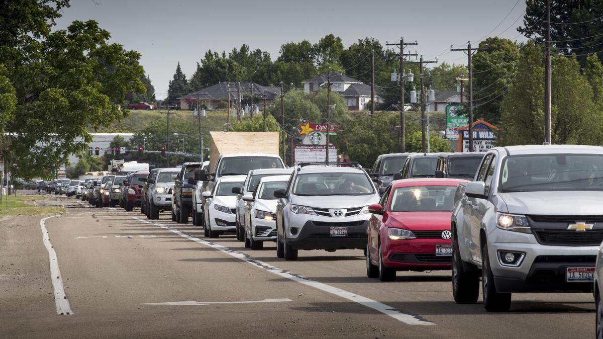 Commuters inch along Garden City’s Glenwood Street in bumper-to-bumper traffic.