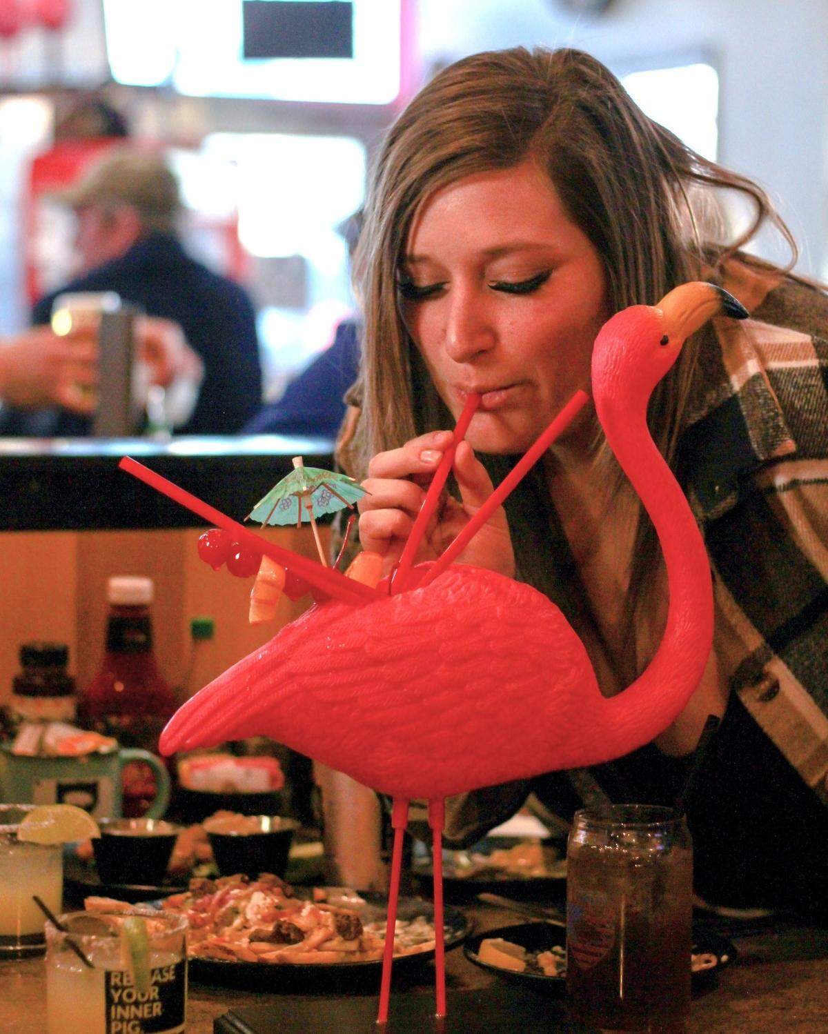 Alcoholic beverages on the “Adulting” menu at Biscuit & Hogs include the Mango Mingo: three mango mimosas topped off with a mango White Claw and fresh fruit.