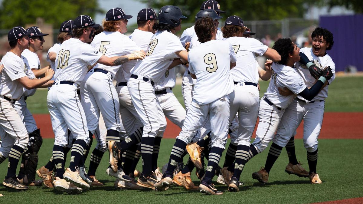 Middleton senior Isaiah Anzaldua, second from right, celebrates with teammates after hitting a walk-off single in the bottom of the 10th inning to defeat Timberline 2-1 in the first round of the 5A baseball state tournament Thursday at Wolfe Field in Caldwell.