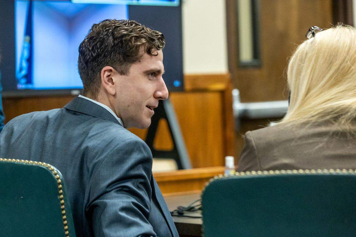 Bryan Kohberger, the man charged with killing four University of Idaho students in November 2022, talks to defense attorney Anne Taylor at his pretrial hearing Friday in Latah County Court.
