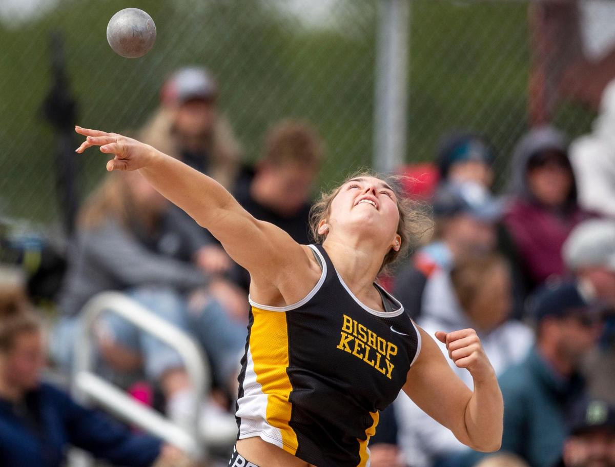 Bishop Kelly’s Jacoba Luteyn heaves the shot put last spring. She’s close to breaking the 4A state meet record in the event.