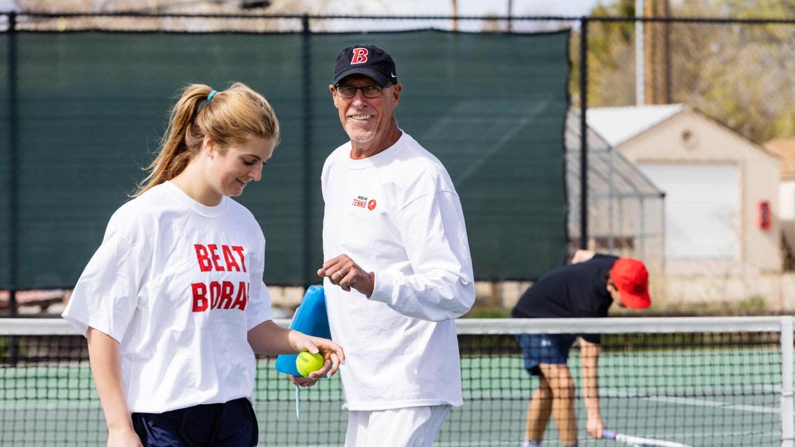 Boise High tennis coach Greg Patton gets his team ready for a match against Borah High on April 20. Patton coached Boise State University tennis for 22 years before retiring and coming back to coach for the high school.