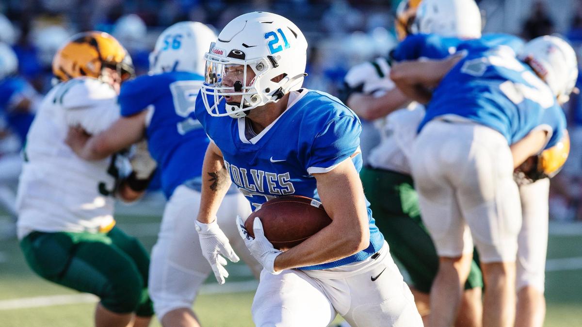 Timberline running back Taylor Marcum will walk on at Boise State next year, choosing the Broncos over a full-ride scholarship from Montana State.