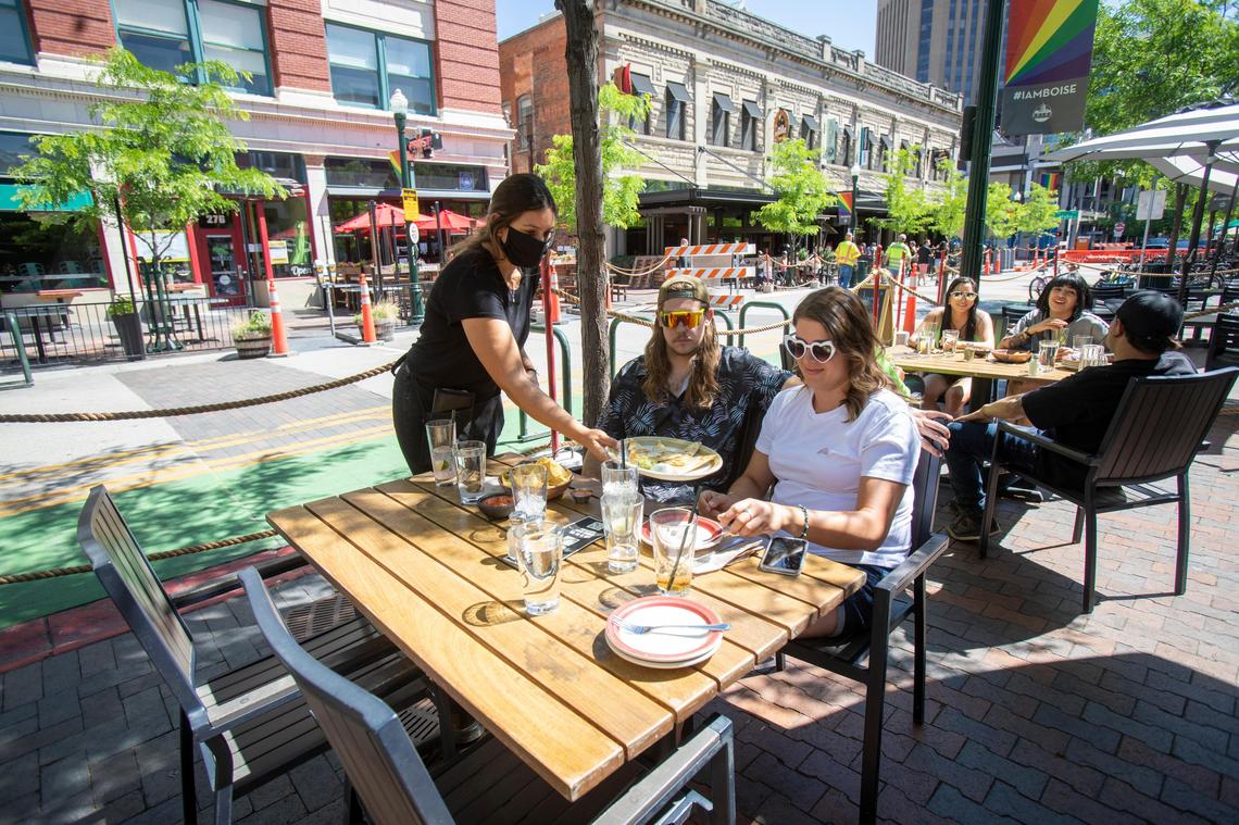 John Carlson and Kathryn Richie enjoy the patio at Matador. on 8th Street in downtown Bosie this spring.