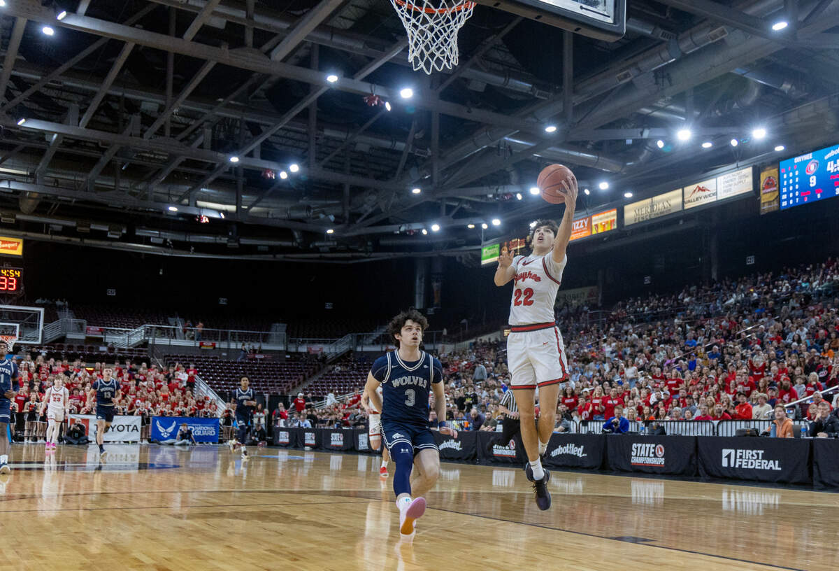 Owyhee senior Jayce Allen scores during the championship game against Lake City in the 6A boys basketball state tournament held at Ford Idaho Center in Nampa in March. Owyhee defeated Lake City 77-46.