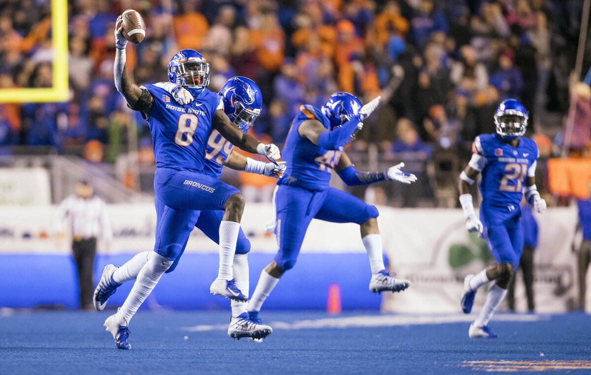 Boise State linebacker Jabril Frazier (8) celebrates recovering a BYU fumble late in the second quarter Saturday at Albertsons Stadium in Boise.