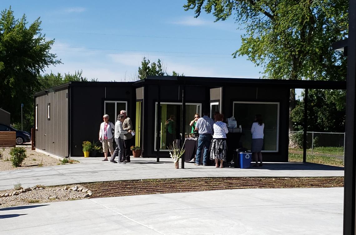 The four homes at Windy Court made from shipping containers each have four bedrooms, two bathrooms and 960 square feet. Each home includes a carport and the complex includes community gardens.