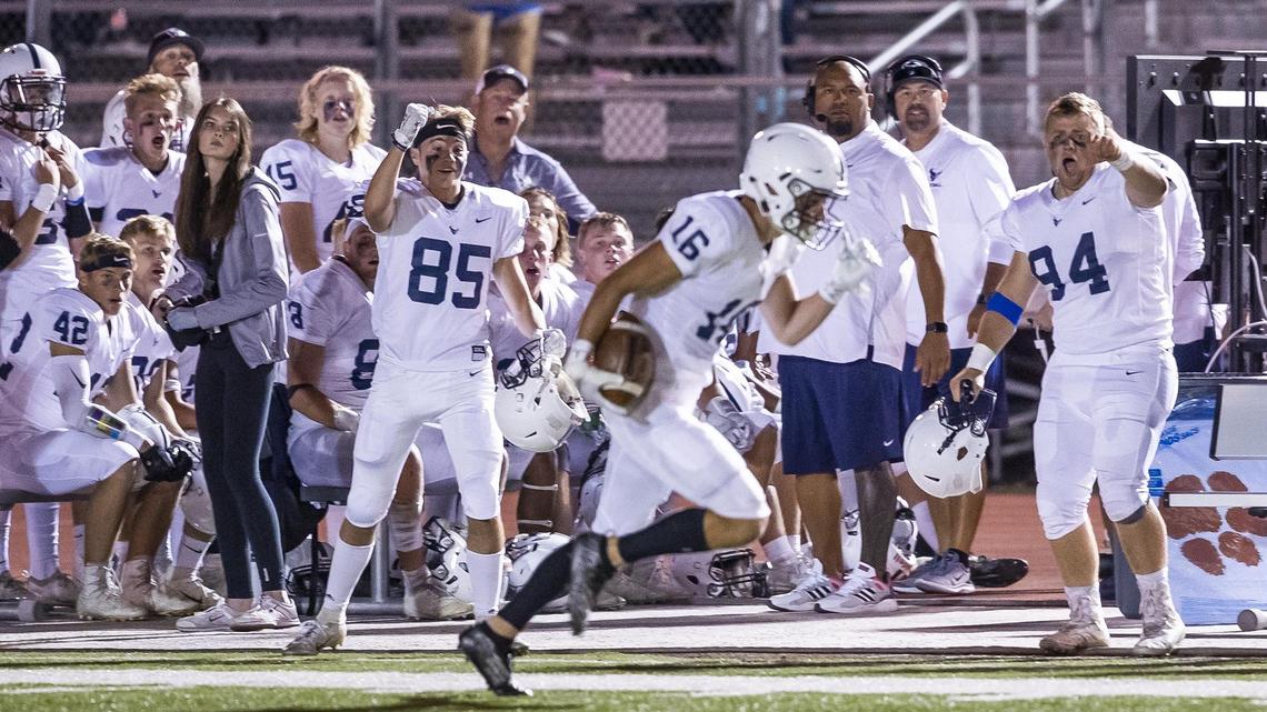 Mountain View wide receiver Colby Peugh runs 85 yards untouched to the end zone on a sideline pass in the second half Friday at Dona Larsen Park in Boise.