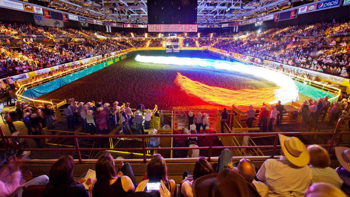 The Snake River Stampeders light up the Idaho Center arena during the opening of the 97th Snake River Stampede rodeo in 2012 in Nampa
