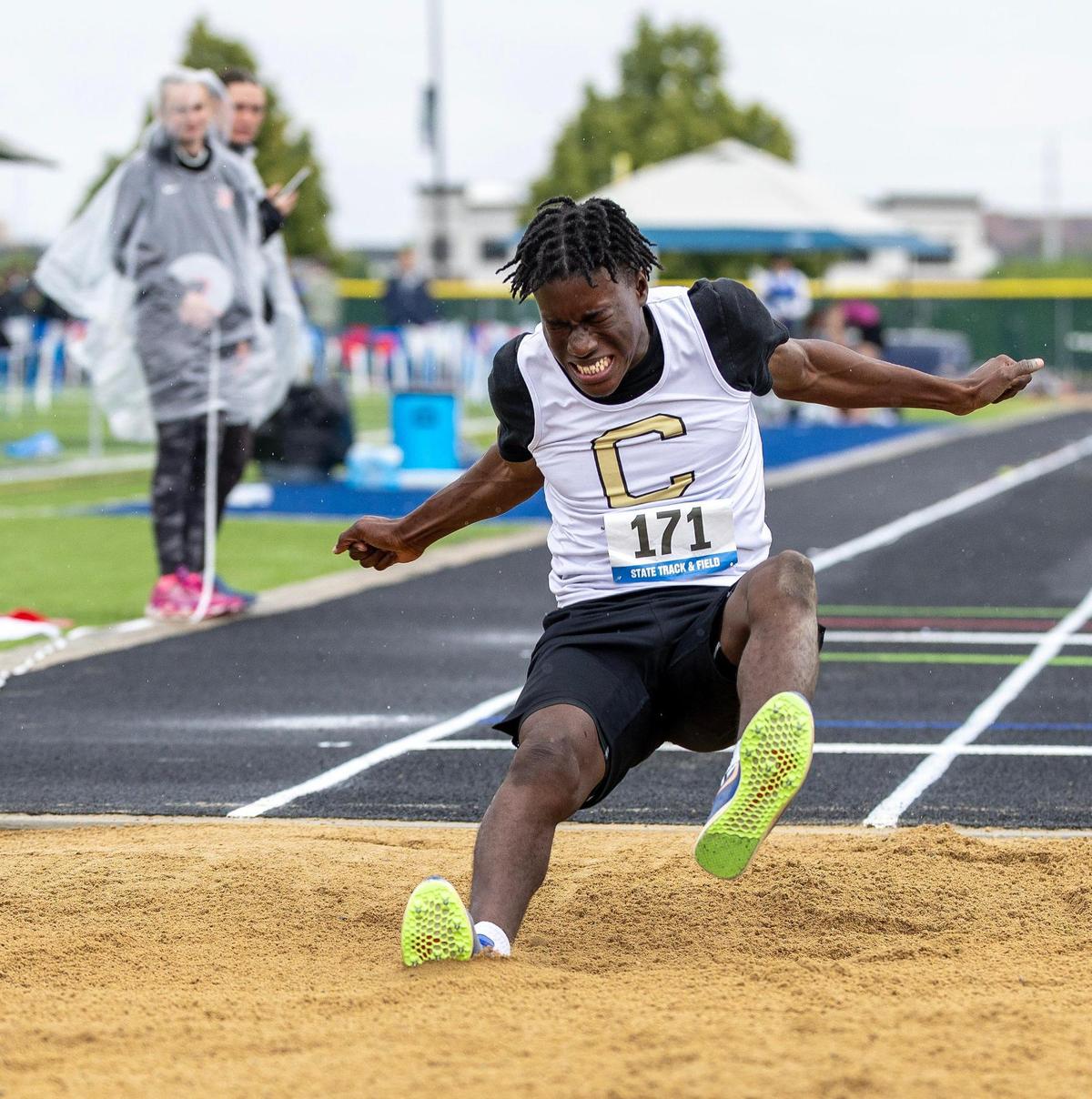 Nick Loufoua of Capital takes second in the 6A boys triple jump at last year’s state meet at Mountain View High School.