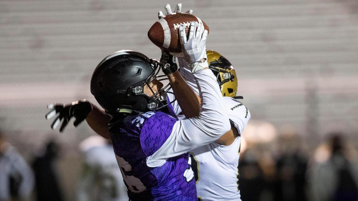 Rocky Mountain fullback Luke Luchini grabs, and holds onto, a touchdown pass defended by Capital’s De’Andre Atkins. The touchdown put the Grizzlies ahead 49-6 in the fourth quarter of the 5A SIC conference championship Friday, Oct. 23, 2020 at Rocky Mountain High School in Meridian.