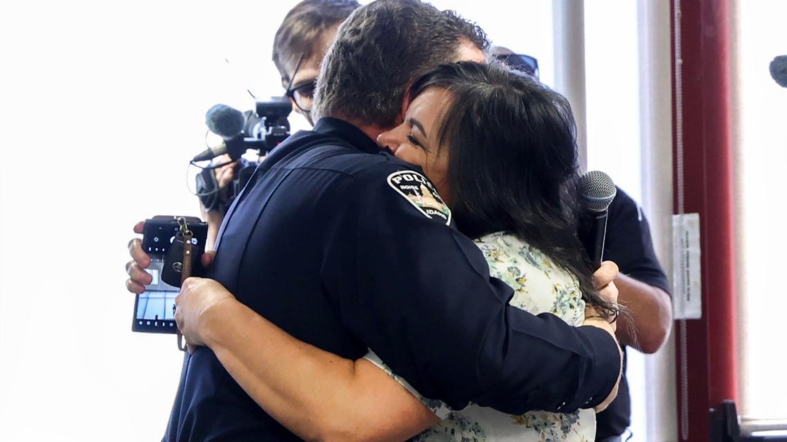 After thanking his wife, Zelphie, Police Chief Ron Winegar gives her a hug after removing his Boise Police Department badge at a farewell ceremony Thursday in front of staff, friends and family at City Hall West.