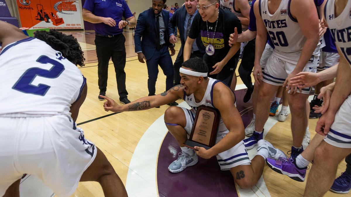 College of Idaho senior Ivory Miles-Williams points as a Yotes sticker is advanced in the NAIA National Championship bracket after a 57-52 victory over Ottawa University on Saturday in Caldwell.