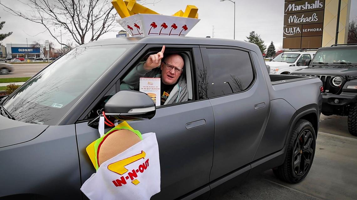 In-N-Out fan Keith Smith, Boise, adorned his pickup with his kids’ Halloween costumes. He had just turned the corner and could see the menu order sign at the California-based chain’s Idaho debut Tuesday in Meridian.