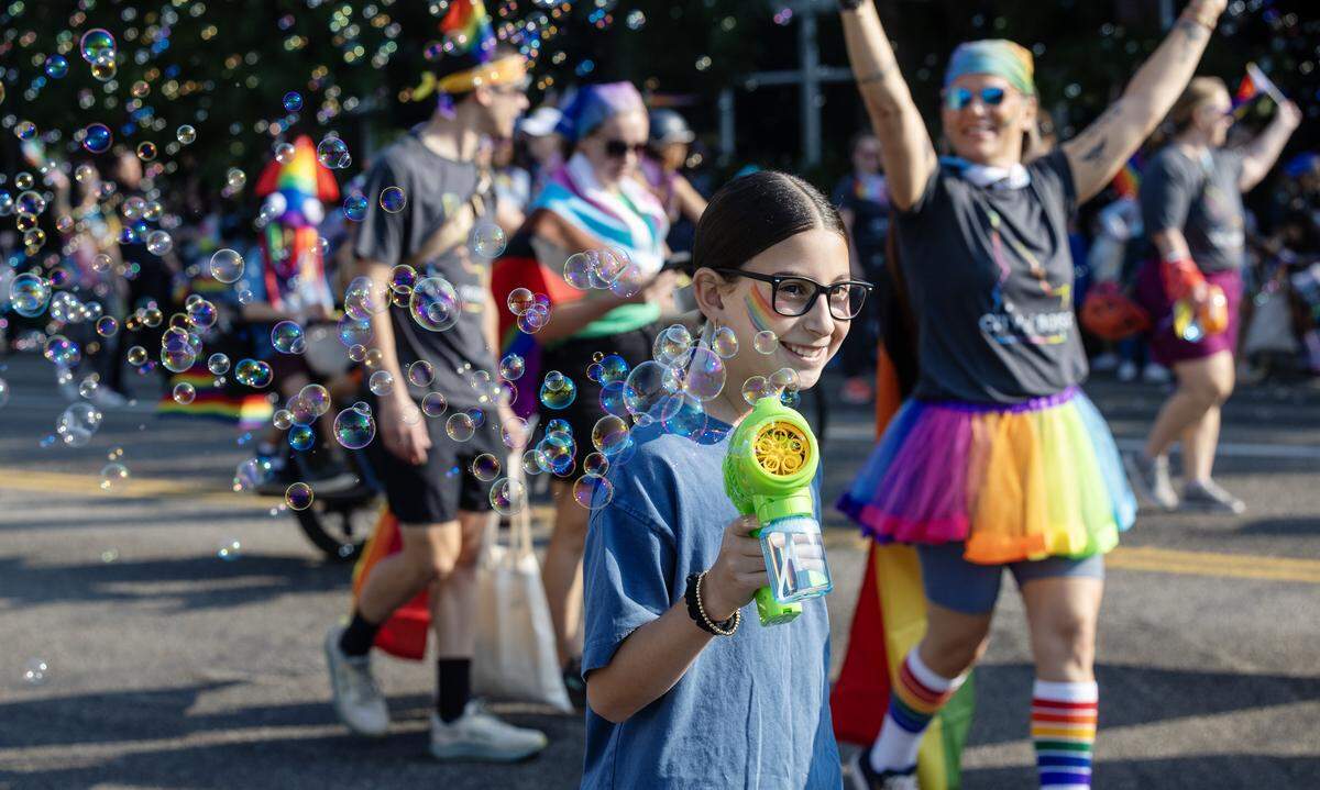 People participate in the Boise Pride parade.
