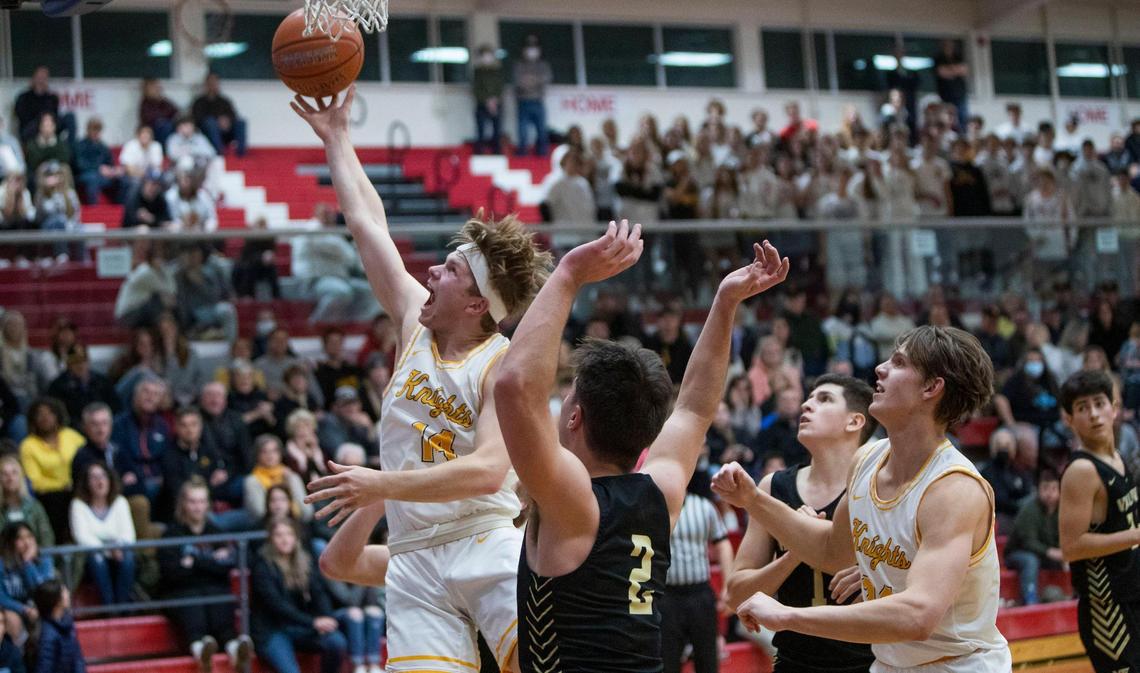 Bishop Kelly senior Gage Alves drives to the basket against Vallivue in the 4A District Three championship Thursday at Nampa High School.