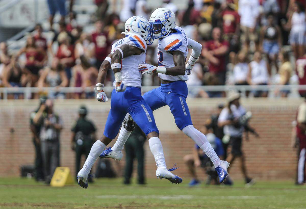 Boise State defensive backs Jalen Walker, left, and Tyric LeBeauf celebrate stopping Florida State’s final drive in the Broncos’ 36-31 win over the Seminoles in the 2019 season opener in Tallahassee, Florida. The teams meet again in 2020, this time in Boise.