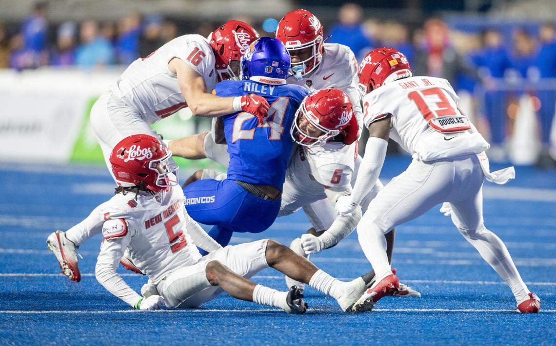 Boise State running back Dylan Riley gets gang-tackled by the New Mexico defense in a home game earlier this season. Riley rushed for 101 yards in that game and 201 the next week against UNLV, but hasn’t had a big game since.