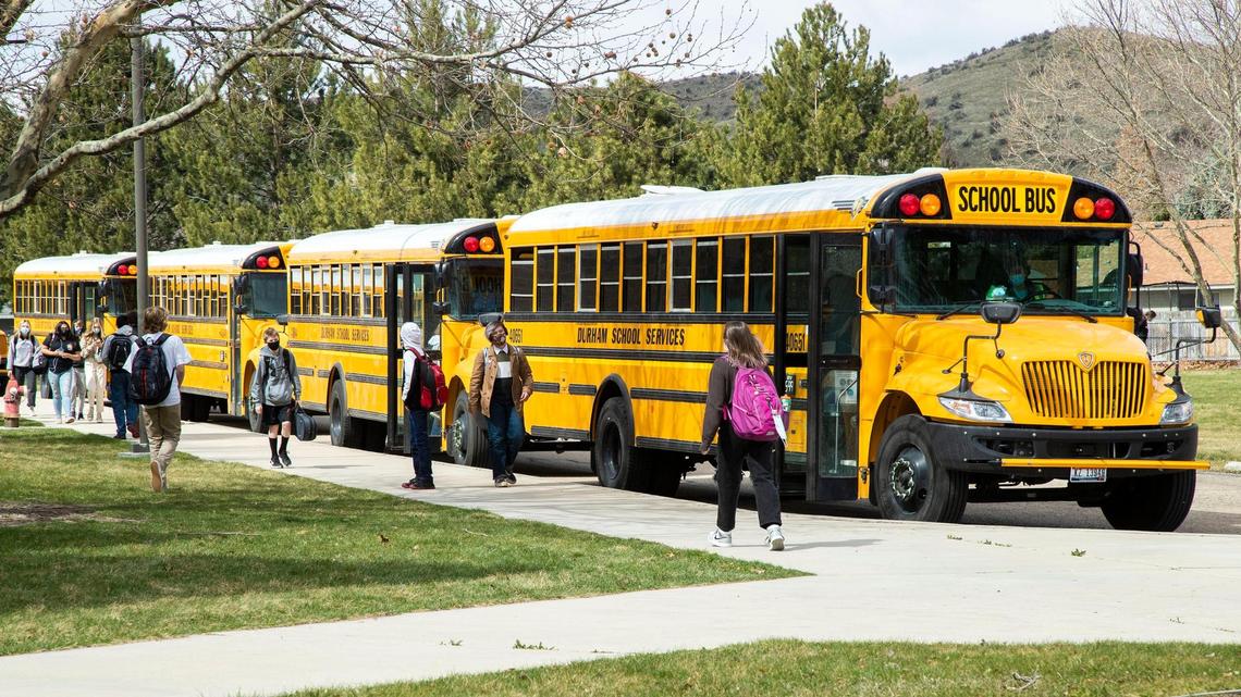 Students at Riverglen Junior High exit school to find their buses March 29. The Boise School District welcomed back all students for five-day, in-person learning after a year of remote and hybrid classes.