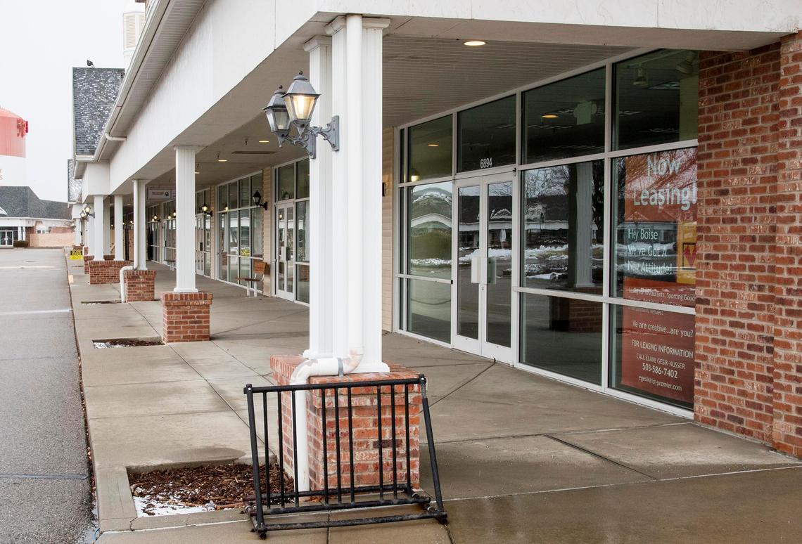 Many of the spaces at Boise Outlets are vacant, with signs saying they are available to lease.