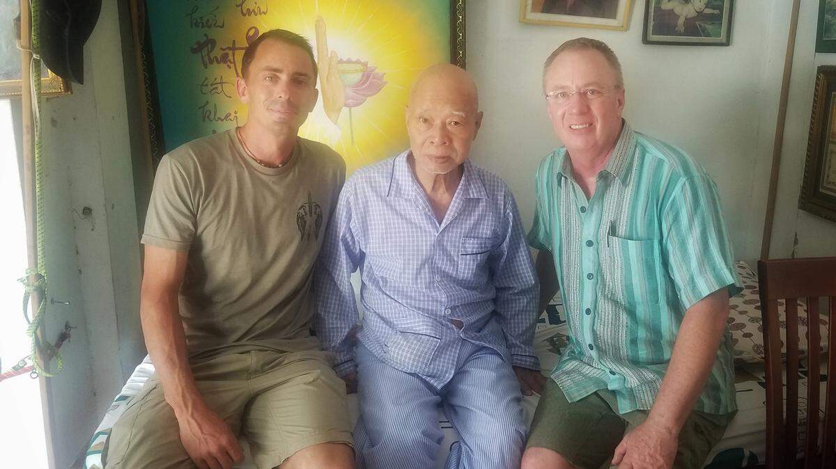 Tom Rosen, of Boise, went to Vietnam on vacation with his son, TJ, left. Rosen’s most cherished possession is a painting his brother commissioned while serving in the Vietnam War. Rosen was shocked to meet the painting’s artist, Rin, center, during his trip.