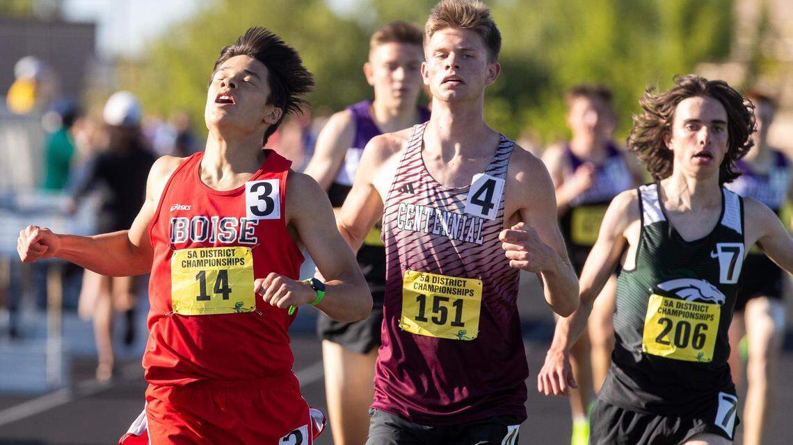 Boise’s Noe Kemper, left, Centennial’s Bryson Blaser and Eagle’s Andrew Ringert take first, second and third, respectively, in the boys 1,600 meters Friday at the 5A District Three track and field championships at Kuna High.