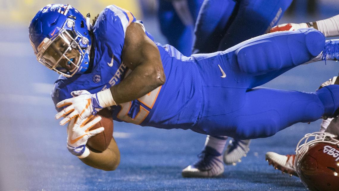 Boise State running back Alexander Mattison (22) dives into the endzone for a Bronco touchdown against Fresno State in the third quarter Friday, Nov. 9, 2018 at Albertsons Stadium in Boise.