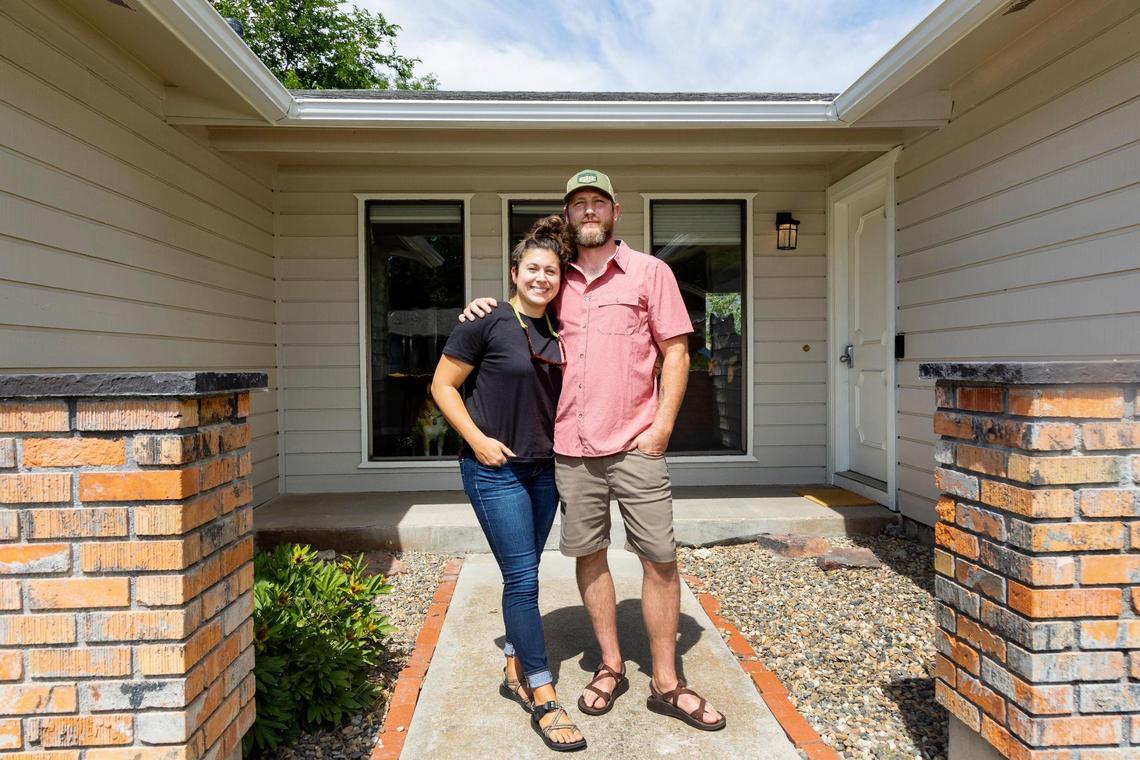 After hearing “horror stories,” about the housing market, Lauren Smith and fiancé Clint Vaughn bought a house a block from where Smith’s parents live.